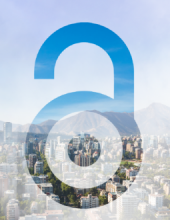 Open access logo of an open lock overlaid on a photo of a city skyline.